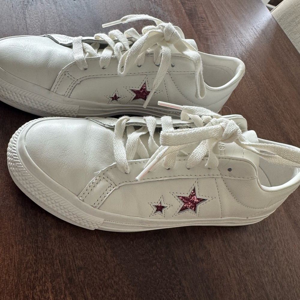 Converse White Sneakers with Pink Star Accents